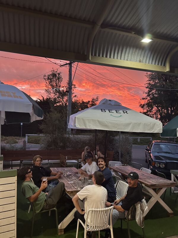 Sunset drinks on the Hey Darl deck