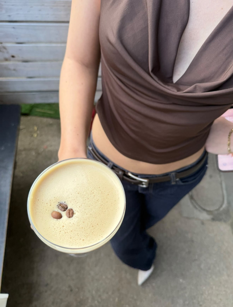 A Hey Darl espresso martini with coffee beans on top